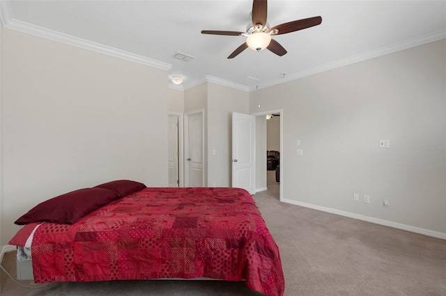 carpeted bedroom featuring baseboards, attic access, visible vents, and crown molding