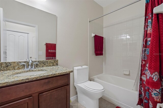 full bathroom with shower / bathtub combination with curtain, vanity, toilet, and tile patterned floors