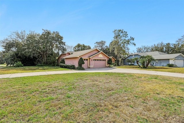 ranch-style house with a front yard and a garage