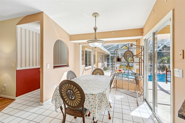 dining room featuring light tile patterned floors