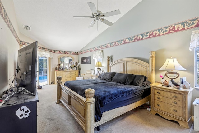 carpeted bedroom with ceiling fan, access to exterior, a textured ceiling, and vaulted ceiling