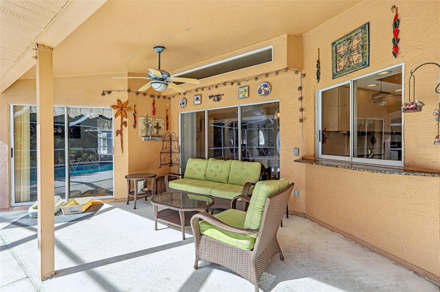 view of patio with ceiling fan and outdoor lounge area