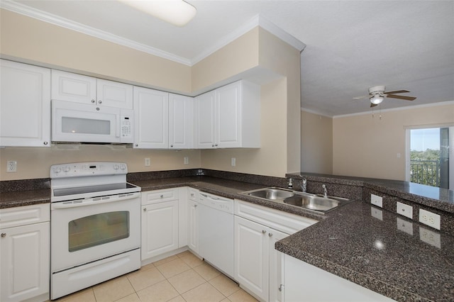 kitchen with sink, white appliances, white cabinets, and ornamental molding