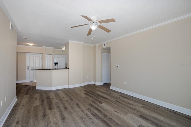 unfurnished living room featuring ceiling fan, dark hardwood / wood-style floors, and crown molding