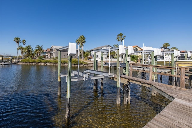 dock area featuring a water view