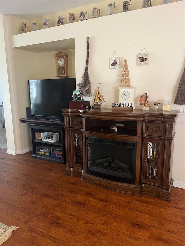 living room with dark wood-type flooring