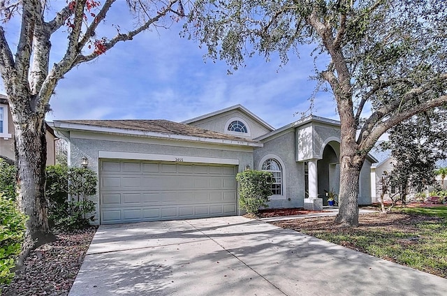 single story home featuring a garage