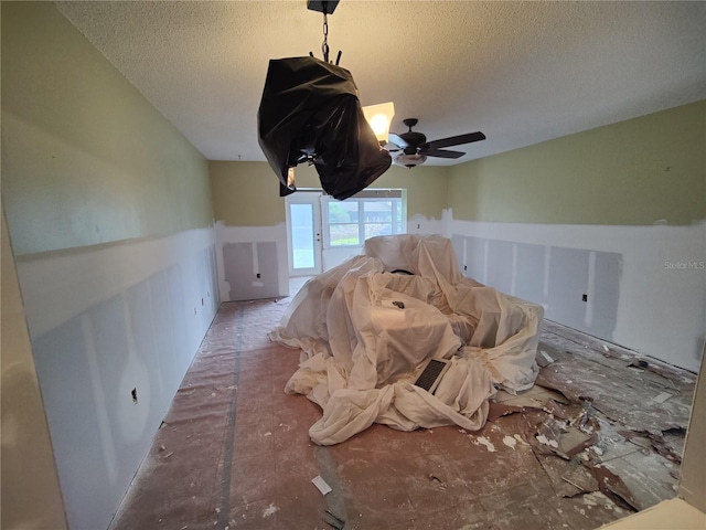 miscellaneous room featuring a textured ceiling