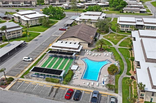 birds eye view of property with a residential view