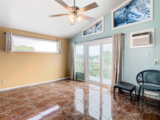 entryway featuring an AC wall unit, lofted ceiling, and ceiling fan