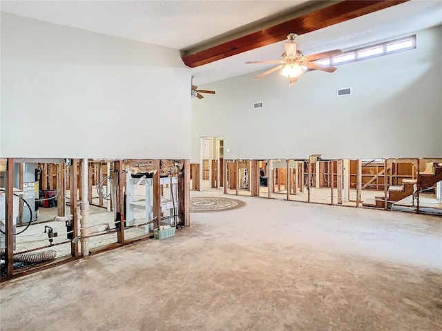 interior space featuring beam ceiling, high vaulted ceiling, and ceiling fan