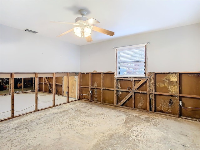 interior space with ceiling fan