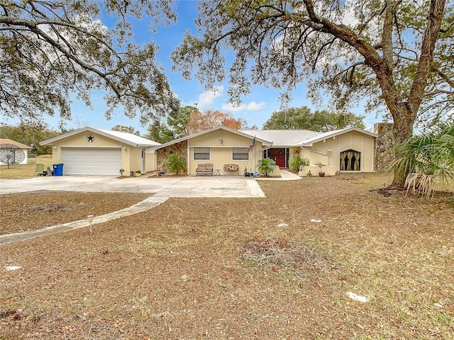 single story home with a garage