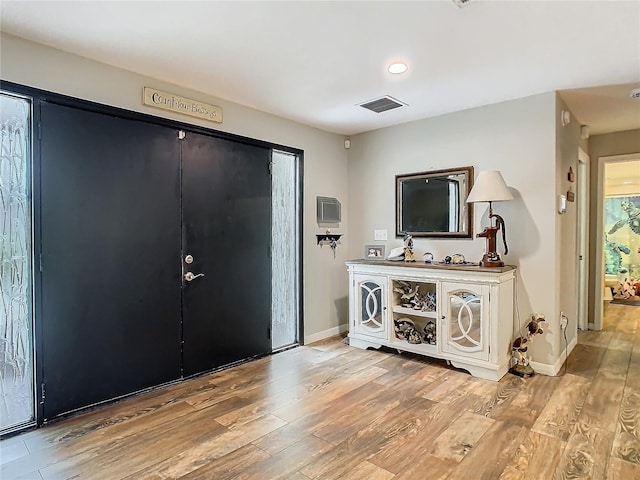 entryway with light wood-type flooring