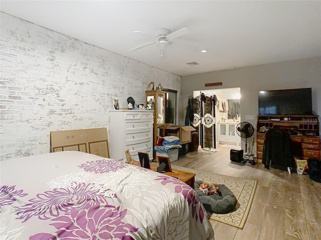 bedroom featuring light wood-type flooring and ceiling fan