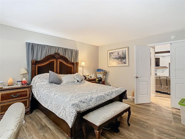 bedroom featuring light hardwood / wood-style flooring