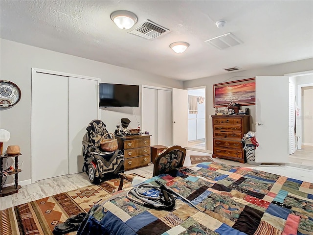 bedroom featuring light wood-type flooring