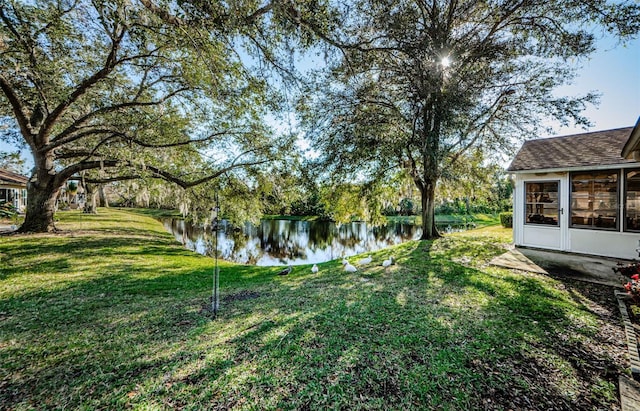 view of yard with a water view