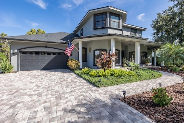 view of front of property featuring a garage