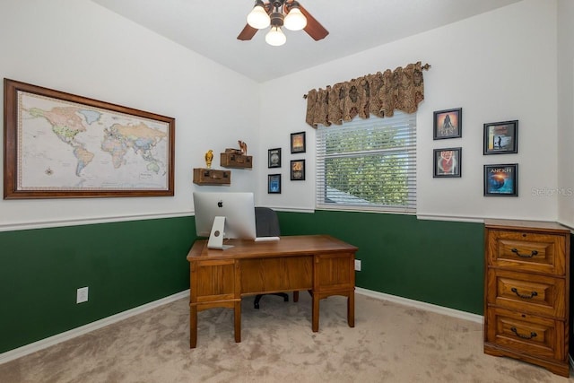 home office featuring ceiling fan and light colored carpet