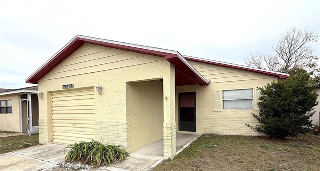 view of front of property with a garage