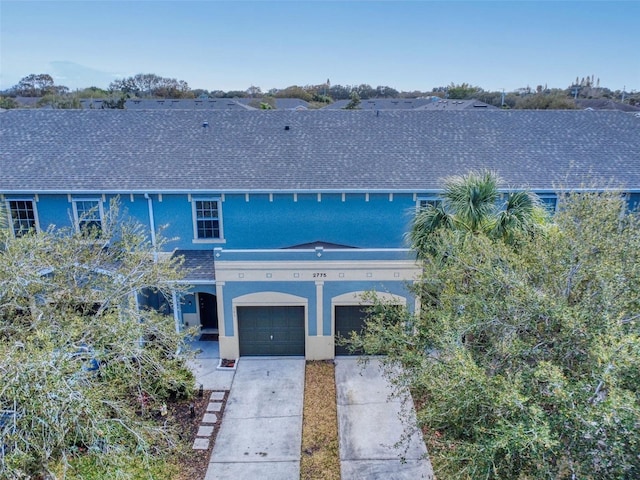 view of front of property featuring a garage