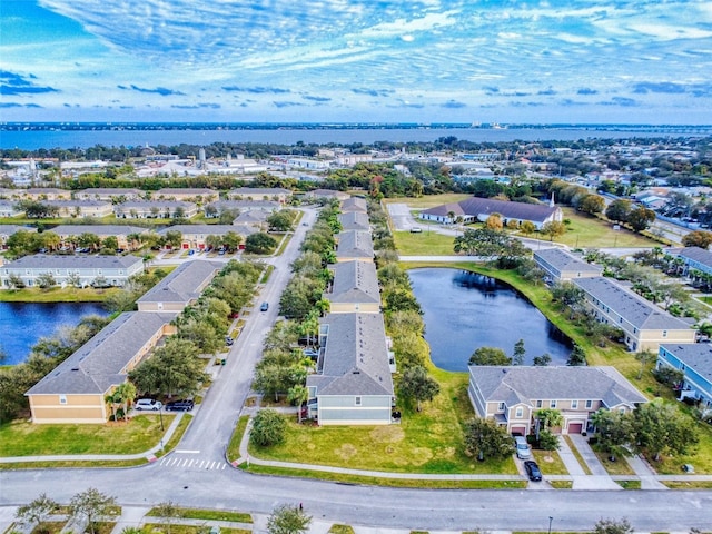 drone / aerial view featuring a water view