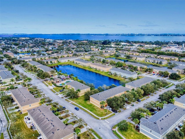 drone / aerial view with a water view