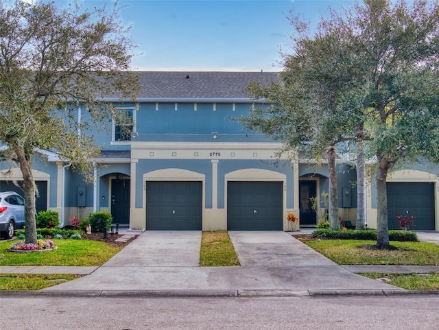 view of front of home with a garage