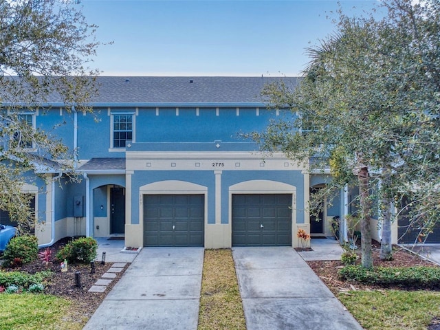 view of front of property with a garage