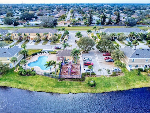 birds eye view of property featuring a water view