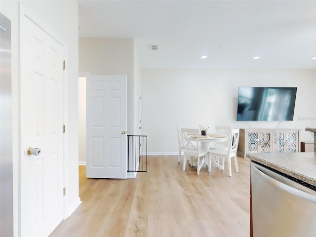 2775 Revolution St Unit 103, Melbourne, FL 32935 - interior space featuring recessed lighting, light wood-style floors, visible vents, and baseboards