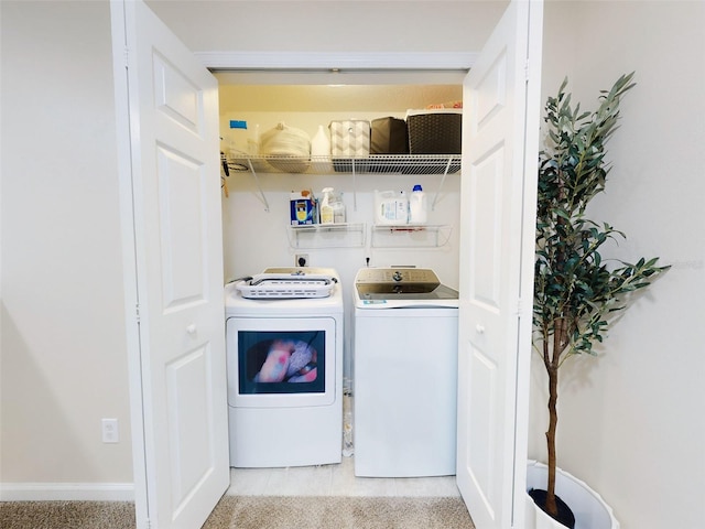 2775 Revolution St Unit 103, Melbourne, FL 32935 - laundry room with washing machine and dryer and laundry area