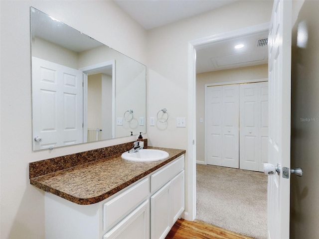 2775 Revolution St Unit 103, Melbourne, FL 32935 - bathroom with baseboards, visible vents, and vanity