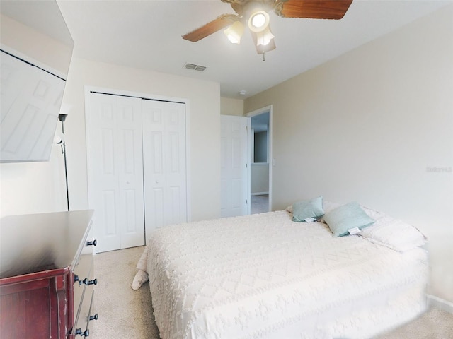 2775 Revolution St Unit 103, Melbourne, FL 32935 - carpeted bedroom with a ceiling fan, visible vents, and a closet