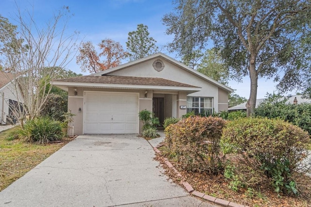 single story home featuring a garage