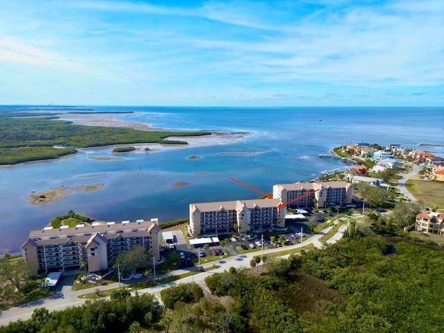 drone / aerial view featuring a water view