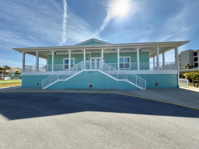 view of front of home featuring covered porch