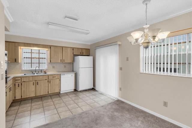 kitchen with white appliances, decorative backsplash, sink, a notable chandelier, and light tile patterned floors