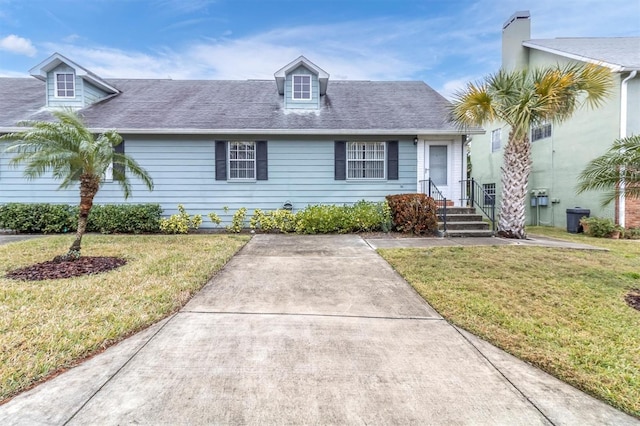 view of front of home with a front lawn