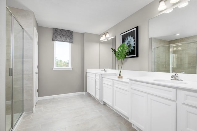 bathroom with walk in shower and vanity