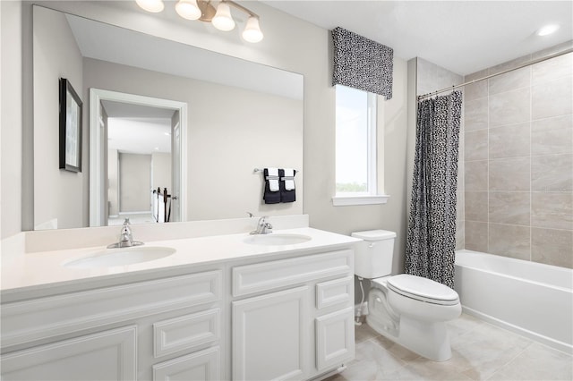 full bathroom with toilet, vanity, and shower / bath combo with shower curtain