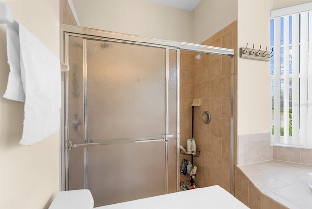 bathroom featuring walk in shower