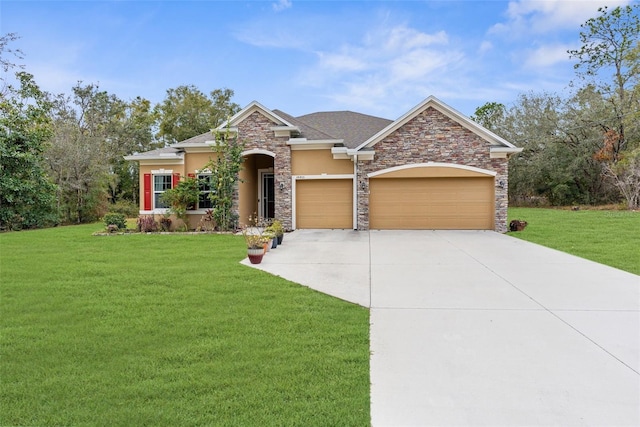 view of front of property with a garage and a front yard