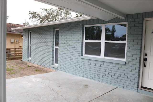 8703 Robilina Rd, Port Richey, FL 34668 - doorway to property featuring a patio