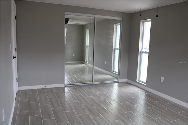 8703 Robilina Rd, Port Richey, FL 34668 - unfurnished bedroom featuring a closet