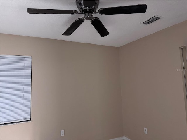 spare room featuring ceiling fan