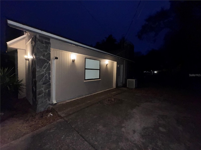 view of property exterior at twilight