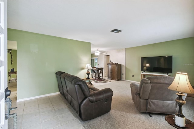 living room featuring ceiling fan