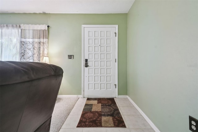 entrance foyer featuring light tile patterned floors